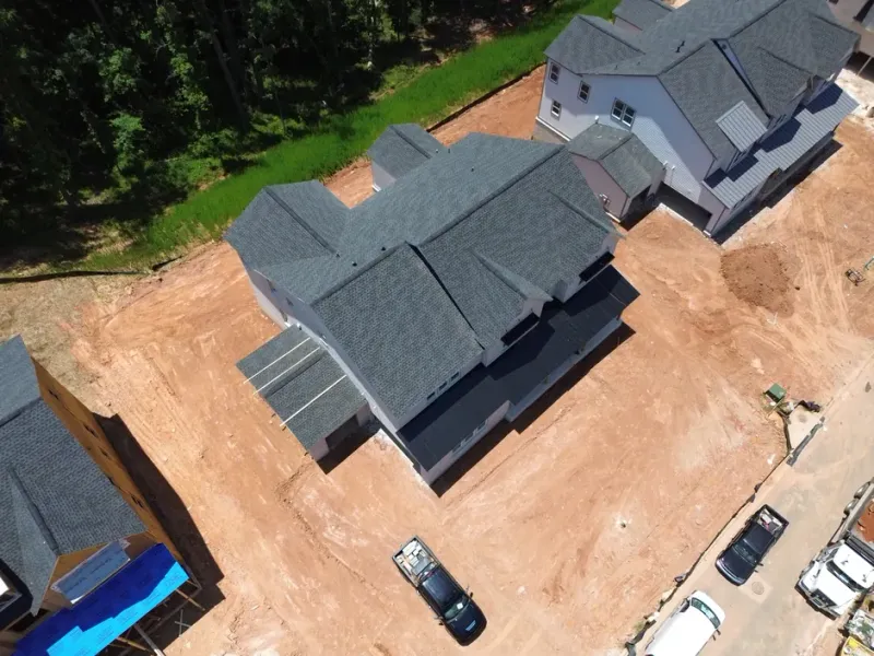 Best Suwanee Roofer team performing a free roof inspection on a residential home in Suwanee, GA